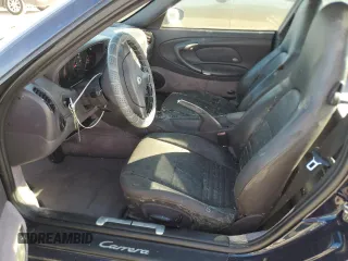 2000 Porsche 911 z VIN WP0AA2996YS621130, wystawiony jako Copart lot #77096434 z przebiegiem Nie podano mil oraz Szkoda całkowita • Salvage title. Historia ofert i sprzedaży dostępna na DreamBid. Obrazek 7.