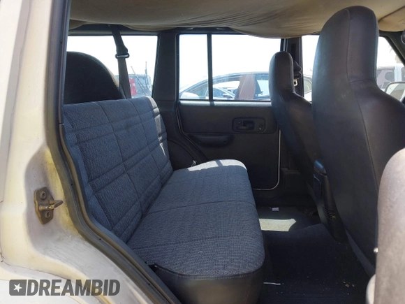 2000 Jeep Cherokee z VIN 1J4FT48S8YL214074, wystawiony jako IAAI lot #42577235 z przebiegiem 287 868 mil mil oraz . Historia ofert i sprzedaży dostępna na DreamBid. Obrazek 8.