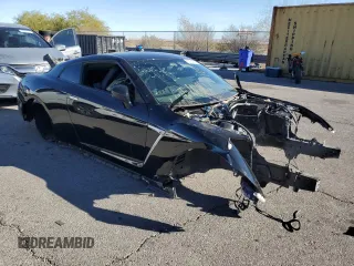 2016 Nissan GT-R Premium с VIN JN1AR5EF6GM290562, выставлен на аукционе Copart как лот 80706814 с пробегом Не указан миль и Списание • Salvage title. История ставок и продаж доступна на DreamBid. Изображение 4.