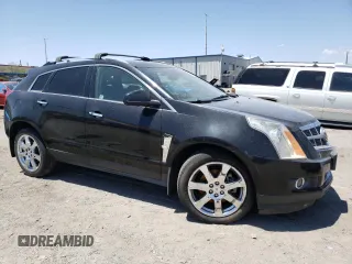 2011 Cadillac SRX Premium Collection with VIN 3GYFNFEY6BS610097, listed as a Copart auction lot 60660235 with 138,616 mi miles and Salvage title. Bid and sale history available at DreamBid. Image 4.