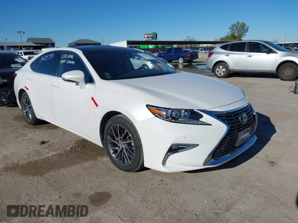 2016 Lexus ES 330 z VIN JTHBK1GG1G2246533, wystawiony jako IAAI lot #41056018 z przebiegiem 66 018 mil mil oraz . Historia ofert i sprzedaży dostępna na DreamBid. Obrazek 1.