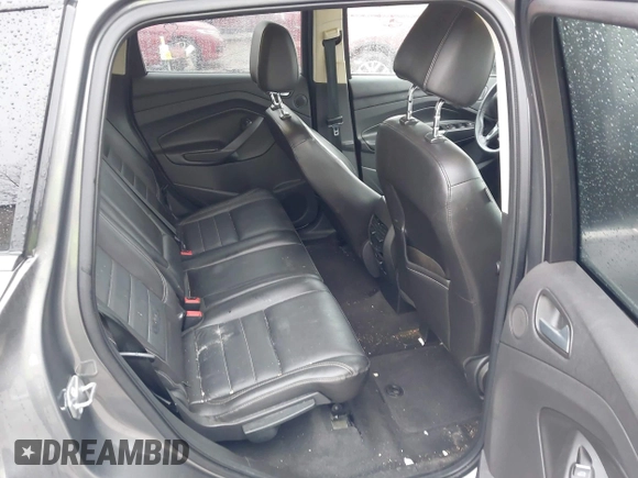 2014 Ford Escape SE with VIN 1FMCU9GX3EUB91417, listed as a IAAI auction lot 42009257 with 87,164 mi miles and . Bid and sale history available at DreamBid. Image 8.
