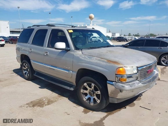 2005 GMC Yukon SLT with VIN 1GKEC13T15R144480, listed as a IAAI auction lot 41632540 with 184,038 mi miles. Bid and sale history available at carsss.com. Image 1.