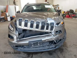 2017 Jeep Cherokee Sport with VIN 1C4PJMAB2HW537884, listed as a IAAI auction lot 42415829 with 89,451 mi miles and . Bid and sale history available at DreamBid. Image 12.