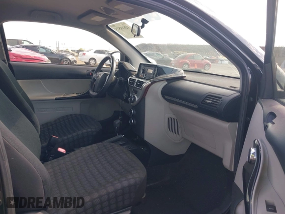 2013 Scion iQ with VIN JTNJJXB04DJ024322, listed as a IAAI auction lot 42618525 with 154,559 mi miles and . Bid and sale history available at DreamBid. Image 5.