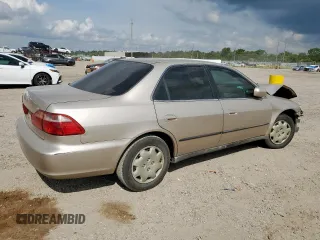 2000 Honda Accord LX z VIN 1HGCG5640YA035354, wystawiony jako Copart lot #58934115 z przebiegiem 167 536 mil mil oraz Szkoda całkowita • Salvage title. Historia ofert i sprzedaży dostępna na DreamBid. Obrazek 3.