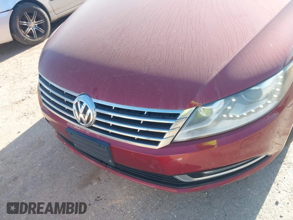 2013 Volkswagen CC Sport with VIN WVWBP7AN4DE558398, listed as a IAAI auction lot 41975725 with 161,982 mi miles. Bid and sale history available at carsss.com. Image 6.