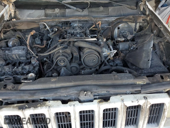 1996 Jeep Grand Cherokee with VIN 1J4EZ78Y9TC104398, listed as a Copart auction lot 69706254 with Not provided miles and Salvage title. Bid and sale history available at DreamBid. Image 11.