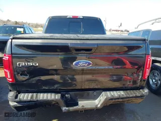 2015 Ford F-150 XLT w/HD Payload Pkg with VIN 1FTFW1EG4FFC97087, listed as a IAAI auction lot 41282930 with 121,506 mi miles. Bid and sale history available at carsss.com. Image 16.