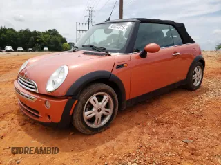 2006 MINI Convertible with VIN WMWRF335X6TF64910, listed as a Copart auction lot 60222215 with 85,761 mi miles and Salvage title. Bid and sale history available at DreamBid. Image 1.