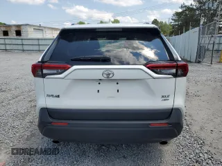 2019 Toyota RAV4 XLE с VIN JTMP1RFV1KD020434, выставлен на аукционе Copart как лот 63588865 с пробегом 61 158 миль миль и Списание • Salvage title. История ставок и продаж доступна на DreamBid. Изображение 6.