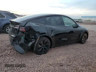 2025 Tesla Model Y Long Range z VIN 7SAYGDED9SF313959, wystawiony jako Copart lot #52823755 z przebiegiem 1 137 mil mil oraz Szkoda całkowita • Salvage title. Historia ofert i sprzedaży dostępna na DreamBid. Obrazek 3.