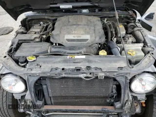 2015 Jeep Wrangler Sahara z VIN 1C4AJWBG2FL614702, wystawiony jako Copart lot #53516315 z przebiegiem 91 899 mil mil oraz Szkoda całkowita • Salvage title. Historia ofert i sprzedaży dostępna na DreamBid. Obrazek 12.
