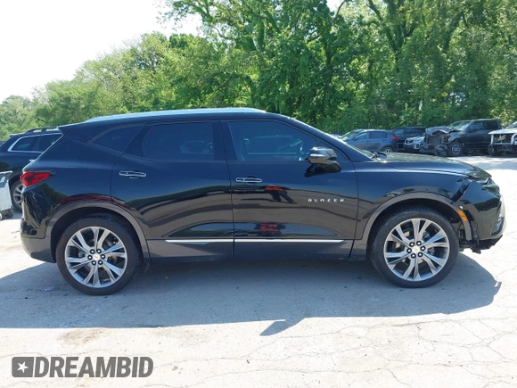 2022 Chevrolet Blazer Premier z VIN 3GNKBFRS4NS128999, wystawiony jako IAAI lot #42157919 z przebiegiem 79 639 mil mil oraz . Historia ofert i sprzedaży dostępna na DreamBid. Obrazek 13.