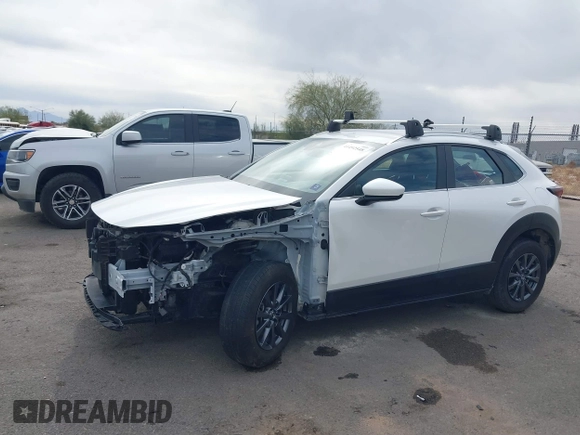 2021 Mazda CX-30 2.5 S with VIN 3MVDMAAL8MM226728, listed as a IAAI auction lot 41492548 with 56,826 mi miles. Bid and sale history available at carsss.com. Image 15.