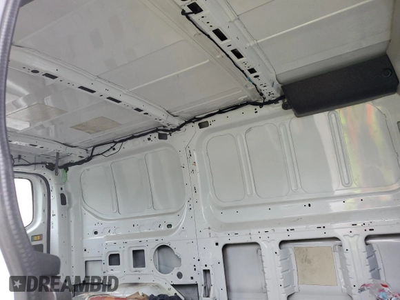 2015 Ford Transit Cargo с VIN 1FTNE1ZM7FKA40687, выставлен на аукционе Copart как лот 56940095 с пробегом 318 811 миль миль и Списание • Salvage title. История ставок и продаж доступна на DreamBid. Изображение 11.