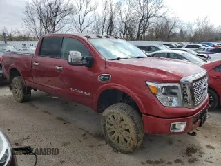 2016 Nissan Titan Platinum Reserve with VIN 1N6BA1F40GN515712, listed as a Copart auction lot 56931745 with 71,096 mi miles and Non repairable. Bid and sale history available at DreamBid. Image 4.