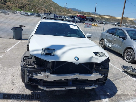 2019 BMW 5 Series 530e with VIN WBAJA9C53KB391999, listed as a IAAI auction lot 42311824 with 79,196 mi miles and . Bid and sale history available at DreamBid. Image 13.