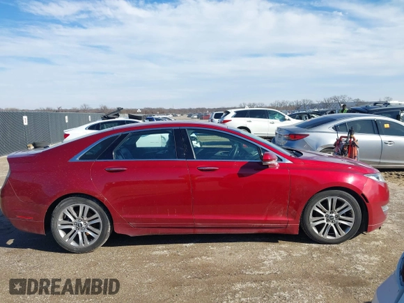 2015 Lincoln MKZ z VIN 3LN6L2G9XFR618075, wystawiony jako IAAI lot #41469247 z przebiegiem 152 966 mil mil oraz . Historia ofert i sprzedaży dostępna na DreamBid. Obrazek 13.