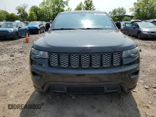 2017 Jeep Grand Cherokee Altitude with VIN 1C4RJFAG5HC892291, listed as a Copart auction lot 58579975 with 71,018 mi miles and Salvage title. Bid and sale history available at DreamBid. Image 5.