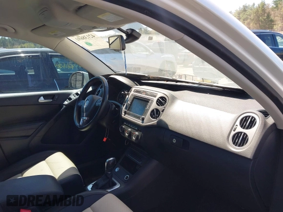 2017 Volkswagen Tiguan S with VIN WVGAV7AX7HW501935, listed as a IAAI auction lot 42138691 with 89,712 mi miles and . Bid and sale history available at DreamBid. Image 5.