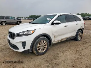 2019 Kia Sorento LX z VIN 5XYPG4A59KG488437, wystawiony jako Copart lot #59207325 z przebiegiem 120 099 mil mil oraz Czysty tytuł • Clean title. Historia ofert i sprzedaży dostępna na DreamBid. Obrazek 1.