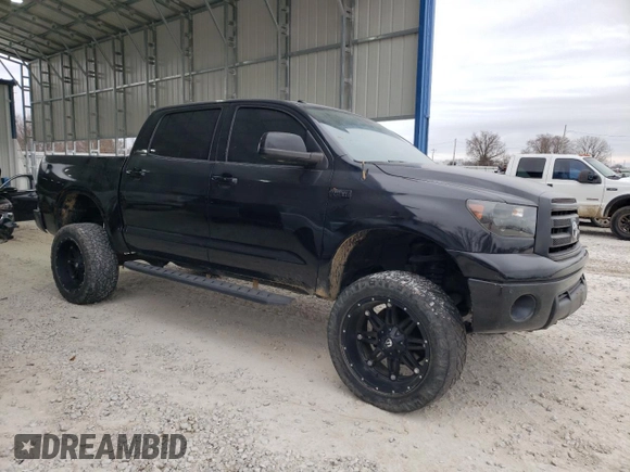 2011 Toyota Tundra 4WD Truck LTD with VIN 5TFHY5F11BX164277, listed as a Copart auction lot 86085284 with 196,307 mi miles and Salvage Title. Bid and sale history available at carsss.com. Image 4.