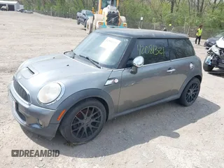 2007 MINI Hardtop S with VIN WMWMF73567TT82315, listed as a IAAI auction lot 42081321 with 123,072 mi miles and . Bid and sale history available at DreamBid. Image 2.
