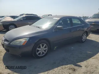 2003 Honda Accord EX z VIN 1HGCM66543A049077, wystawiony jako Copart lot #59642315 z przebiegiem 243 762 mil mil oraz Czysty tytuł • Clean title. Historia ofert i sprzedaży dostępna na DreamBid. Obrazek 1.