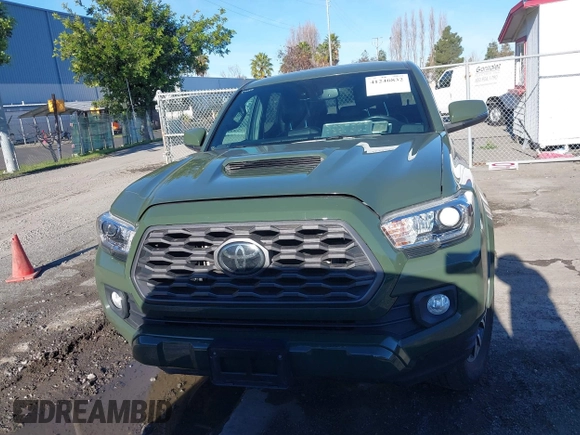 2021 Toyota Tacoma SR with VIN 3TMCZ5AN7MM395940, listed as a IAAI auction lot 41240832 with 39,338 mi miles and . Bid and sale history available at DreamBid. Image 12.