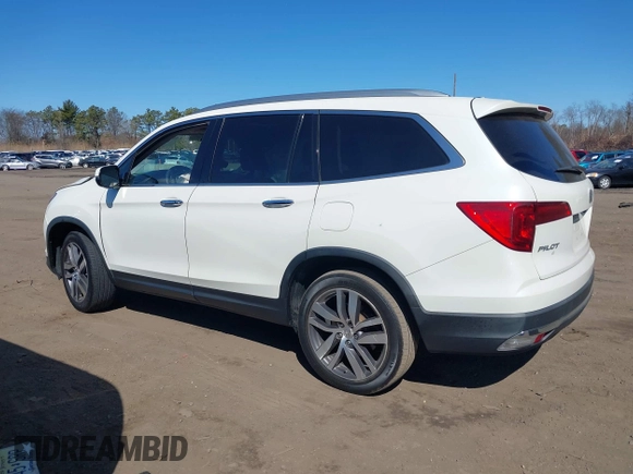 2017 Honda Pilot Touring z VIN 5FNYF6H99HB089121, wystawiony jako IAAI lot #41896878 z przebiegiem 145 330 mil mil oraz . Historia ofert i sprzedaży dostępna na DreamBid. Obrazek 14.