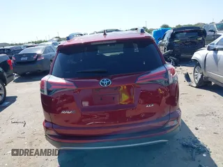 2018 Toyota RAV4 XLE with VIN 2T3WFREV8JW425464, listed as a IAAI auction lot 41977877 with 142,265 mi miles and . Bid and sale history available at carsss.com. Image 16.