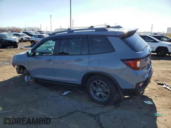 2024 Honda Passport TrailSport with VIN 5FNYF8H64RB005399, listed as a Copart auction lot 48120465 with 11,930 mi miles and Salvage Title. Bid and sale history available at DreamBid. Image 2.