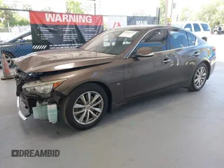 2015 Infiniti Q50 Premium with VIN JN1BV7AP4FM330386, listed as a IAAI auction lot 42028771 with 75,533 mi miles. Bid and sale history available at carsss.com. Image 2.