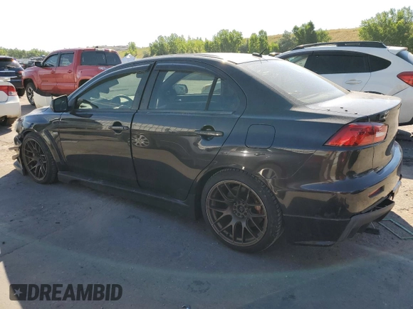 2008 Mitsubishi Lancer Evolution GSR with VIN JA3AW86V58U049914, listed as a Copart auction lot 62105824 with 129,622 mi miles and Salvage Title. Bid and sale history available at carsss.com. Image 2.