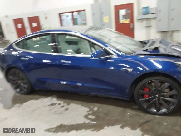 2020 Tesla Model 3 Performance with VIN 5YJ3E1EC7LF641885, listed as a IAAI auction lot 41372794 with NaN miles. Bid and sale history available at carsss.com. Image 12.