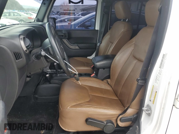 2013 Jeep Wrangler Unlimited Moab with VIN 1C4BJWEG6DL583841, listed as a Copart auction lot 52487915 with 130,369 mi miles and Salvage title. Bid and sale history available at DreamBid. Image 7.