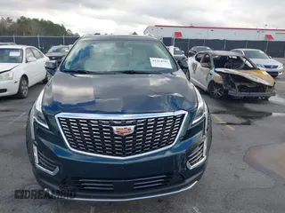 2024 Cadillac XT5 FWD Premium Luxury with VIN 1GYKNCR45RZ733939, listed as a IAAI auction lot 41224515 with 6,945 mi miles. Bid and sale history available at carsss.com. Image 13.