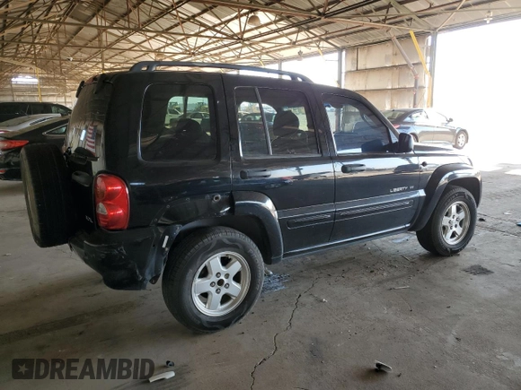 2003 Jeep Liberty Limited with VIN 1J4GL58K13W657703, listed as a Copart auction lot 62957105 with 168,201 mi miles and Salvage title. Bid and sale history available at DreamBid. Image 3.