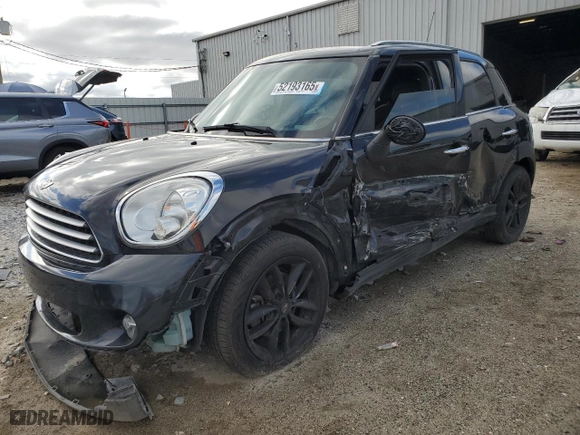 2013 MINI Cooper Countryman with VIN WMWZB3C58DWM07395, listed as a Copart auction lot 52193165 with 147,892 mi miles and Salvage Title. Bid and sale history available at carsss.com. Image 1.