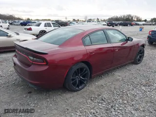 2017 Dodge Charger SE with VIN 2C3CDXBGXHH612156, listed as a IAAI auction lot 41028308 with 123,438 mi miles. Bid and sale history available at carsss.com. Image 4.