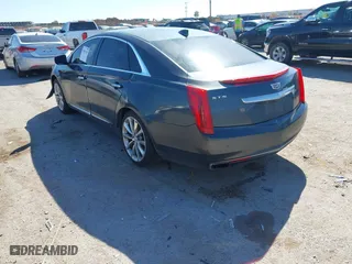 2017 Cadillac XTS Luxury with VIN 2G61M5S32H9159250, listed as a IAAI auction lot 41851329 with 129,944 mi miles. Bid and sale history available at carsss.com. Image 3.