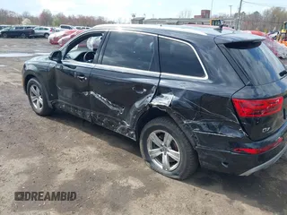 2019 Audi Q7 Premium with VIN WA1AHAF74KD034469, listed as a IAAI auction lot 42037259 with 92,404 mi miles and . Bid and sale history available at DreamBid. Image 6.