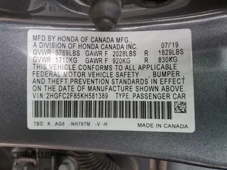 2019 Honda Civic Sport with VIN 2HGFC2F85KH581389, listed as a Copart auction lot 47922085 with 56,050 mi miles and Salvage Title. Bid and sale history available at DreamBid. Image 12.