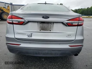 2020 Ford Fusion SE z VIN 3FA6P0HD0LR256243, wystawiony jako Copart lot #56513215 z przebiegiem 59 996 mil mil oraz Szkoda całkowita • Salvage title. Historia ofert i sprzedaży dostępna na DreamBid. Obrazek 6.