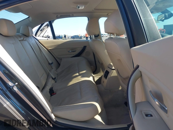 2014 BMW 3 Series 328i with VIN WBA3C1C57EK116483, listed as a IAAI auction lot 42697759 with 113,010 mi miles and . Bid and sale history available at DreamBid. Image 8.