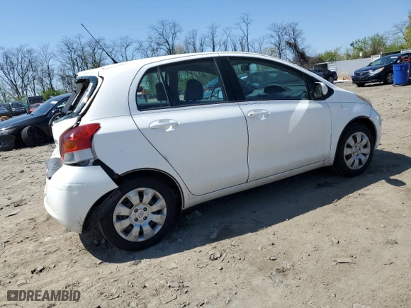 2009 Toyota Yaris with VIN JTDKT903695248767, listed as a Copart auction lot 52327265 with 211,184 mi miles and Salvage Title. Bid and sale history available at carsss.com. Image 3.