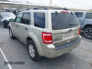 2012 Ford Escape XLT with VIN 1FMCU0D74CKA07739, listed as a IAAI auction lot 42100820 with 308,265 mi miles. Bid and sale history available at carsss.com. Image 3.