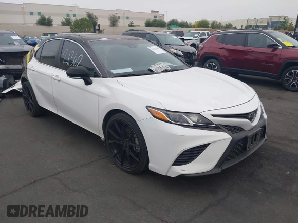2018 Toyota Camry LE z VIN 4T1B11HK7JU111555, wystawiony jako IAAI lot #42421362 z przebiegiem 102 404 mil mil oraz . Historia ofert i sprzedaży dostępna na DreamBid. Obrazek 14.