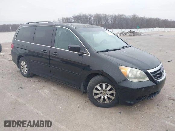 2010 Honda Odyssey EX-L with VIN 5FNRL3H73AB078714, listed as a IAAI auction lot 41520151 with 218,466 mi miles and . Bid and sale history available at DreamBid. Image 1.